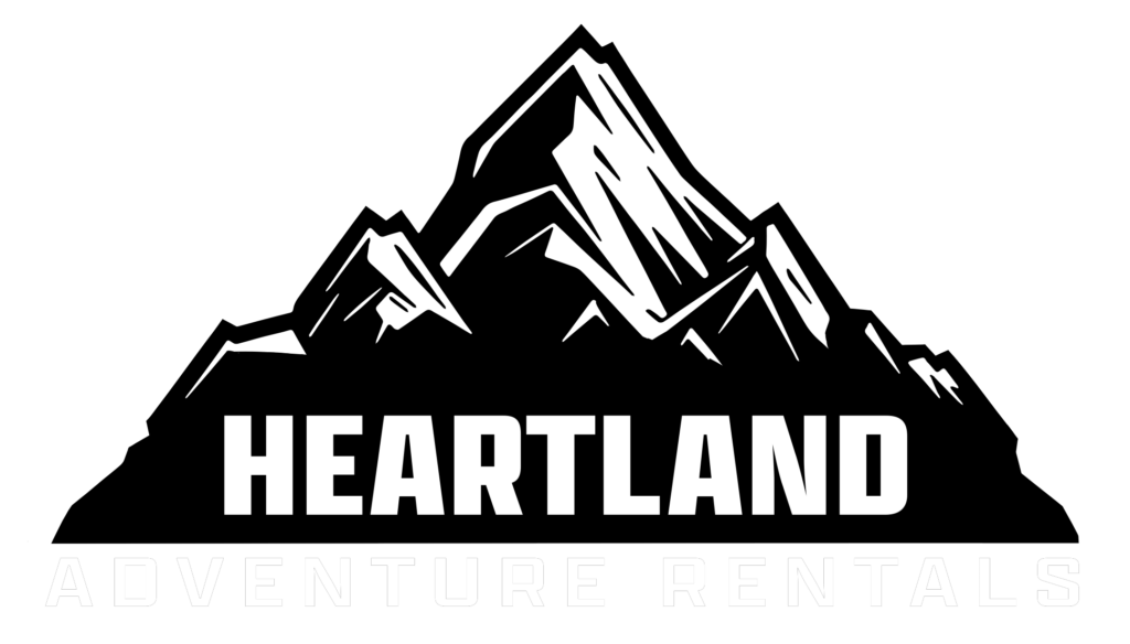 Heartland Adventure Rentals logo with a mountain in the background